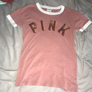 a rose gold pink short sleeve top